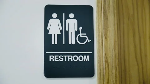 Zoom in on Unisex Public Restroom Sign Stock Footage