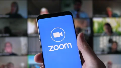 Zoom Video Call on Computer Screen and Smartphone app Stock Footage 152118368