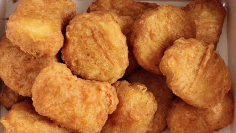 Zoom-in video of chicken nuggets Stock Footage 323499720