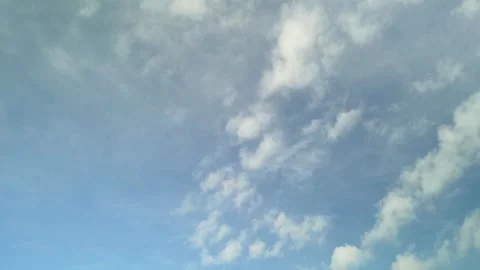 Zoom in view of the blue sky with white clouds. 動画素材 255293137