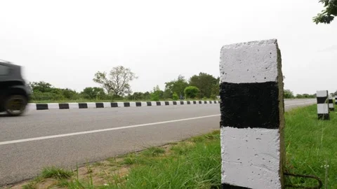 Zoom in view of White and black traffic control sign Видео 156990213