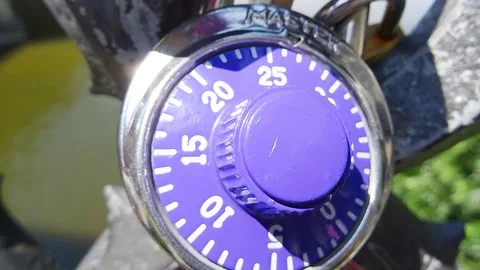 Zoom in of violet combination padlock on a bridge 4k Video stock 110725182