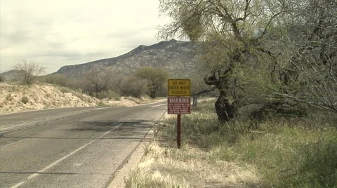 Zoom-in to the Warning flood sign. Stock Footage 54757694