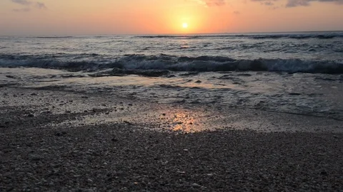 Zoom Waves and Sunset at Padang Padang Beach Stock Footage 95930482