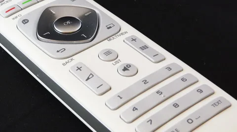 Zoom in on a white remote control Stock Footage 47244098