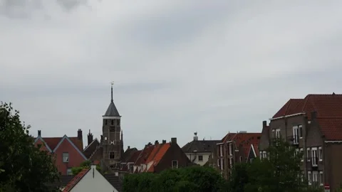 Zoom In on Windmill and town hall of Willemstad Stockbeeldmateriaal 253702684