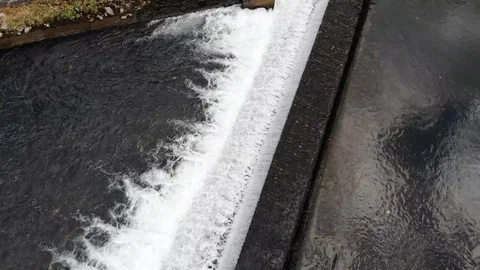 Zoomed in dam drone flyover Stock Footage 119498983