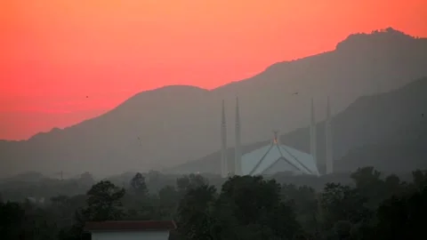 Zoomed long shot of faisal misque in Islamabad pakistan at sunset Stock Footage 199278406