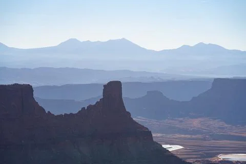 Zoomed shot of multiple layers of canyons and mountains Photos