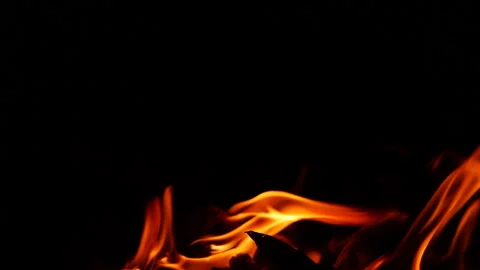 Zoomed in slow motion video of fire burn... | Stock Video | Pond5