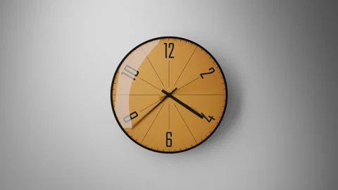 Zooming in on an analog clock with a yellow face in fast motion, time flies by Stock Footage 340345786