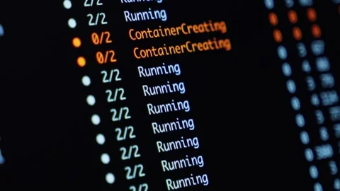 Zooming and scrolling terminal screen with running container statuses and c.. Stock Footage 304804538