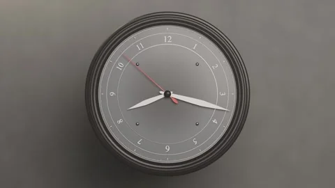 Zooming camera toward round gray wall clock, red seconds hand sweeping to Stock Footage 337505110