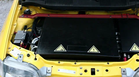 Zooming on electric components under the car hood Stock Footage