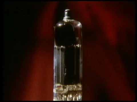 Zooming in on glass object with light blinking inside, number code appears, 1985 Video stock 136674277