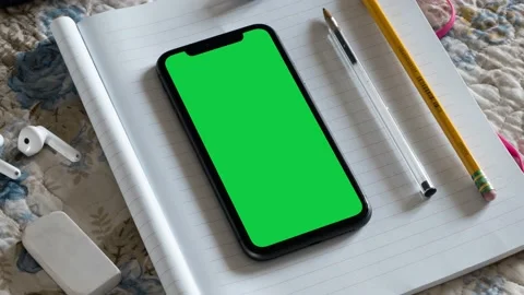 Zooming on a Green Screen Smartphone Stock Footage 239763268