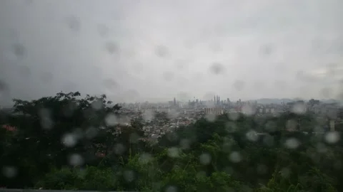 A zooming KL thru rain drop Stock Footage 145804989