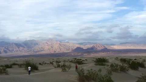 Zooming motion timelapse of mountains and sand dunes in Death valley, Califor Stock Footage 70008745