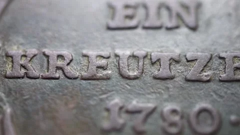 Zooming in on an old coin Stock Footage 306647708