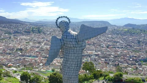 Zooming out on el Panecillo, a statue of the virgin of Quito Stock Footage 155299957