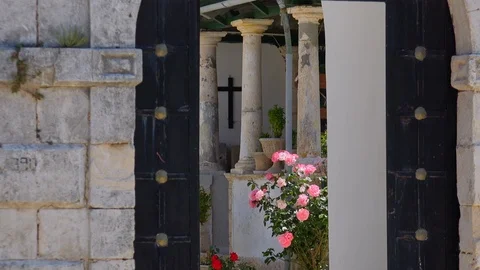 Zooming out of inner yard of Monastery of Saint George Kremnon on Zakynthos Stock-Footage 117717860