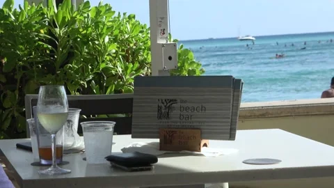 Zooming Out From Menu At A Beach Bar In Waikiki, Honolulu, Hawaii Stock Footage 154356262