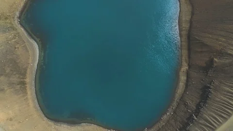 Zooming out over a caldera Stock-Footage 79514774