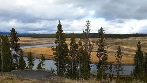 Zooming pan Timelapse of forest, fields and ponds, at a cloudy autumn day, .. Stock Footage 71755483