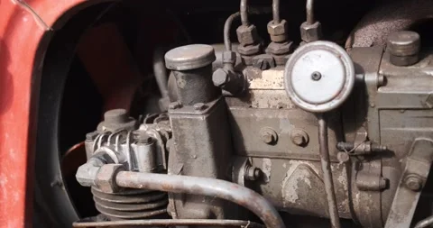 Zooming into the retro tractor engine. Close up of an old vintage engine, 4k Stock Footage 142801703