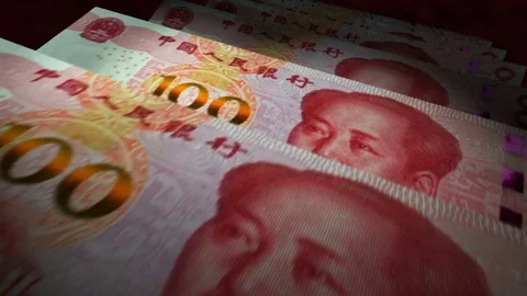 Zooming into a stack of Chinese Yuan banknotes Video stock 71834385