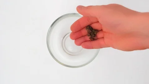 Zooming in on Time-lapse of making Green tea Stock Footage 125482557