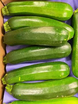 Zucchini in a box Stock Photos