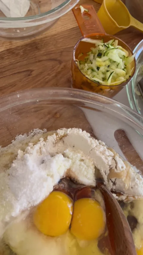 Zucchini cake preparation vertical view Stock Footage 247663869