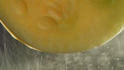 Zucchini close-up macro. Slice fresh courgette vegetable texture background Stock Footage 261774496