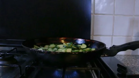 Zucchini cooking in a pan Stock Footage 93250045
