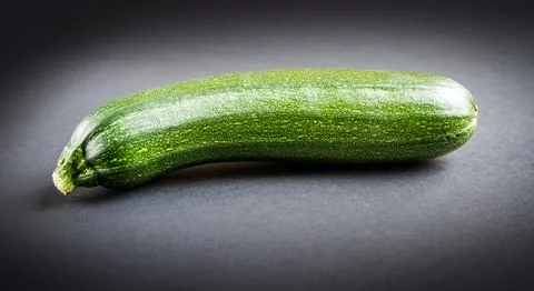 Zucchini isolated on a black background Stock Photos