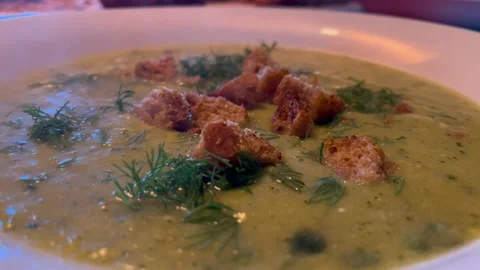 Zucchini Leek Soup With Fresh Dill And Croutons Steaming Hot Food Dinner Stock Footage 219831776