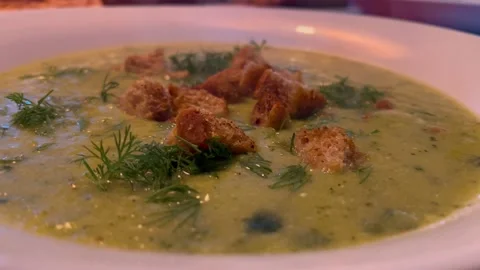 Zucchini Leek Soup With Fresh Dill And Croutons Steaming Hot Food Dinner Stock Footage 219831779