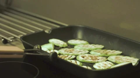 Zucchini on pan Video stock 68204459