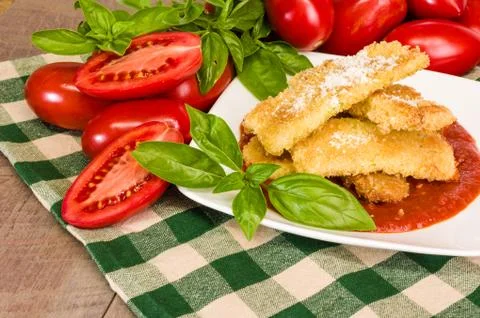 Zucchini parmesan dinner with basil Foto stock