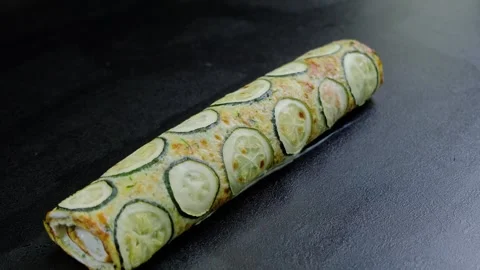 Zucchini Roll Appetizer on Dark Surface Cooking Video stock 341421718
