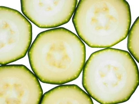 Zucchini slices isolated Stock Photos
