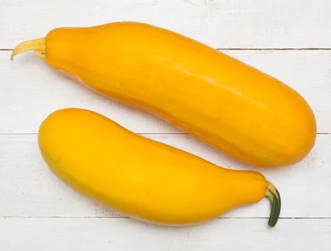 Zucchini on table Stock Photos