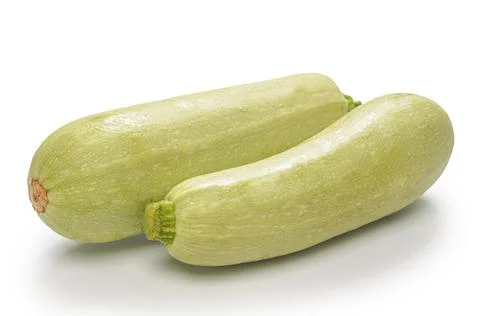Zucchini on white background with soft shadow Stock Photos