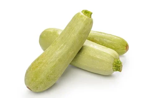 Zucchini on white background with soft shadow Stock Photos