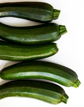 Zucchini (zucchetti, courgettes) on a white background Stock Photos
