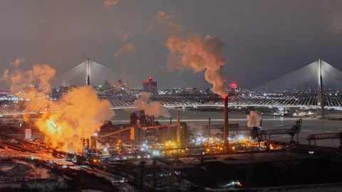 Zug Island industrial complex polluting Detroit River at night, Detroit Stock Footage 332744493