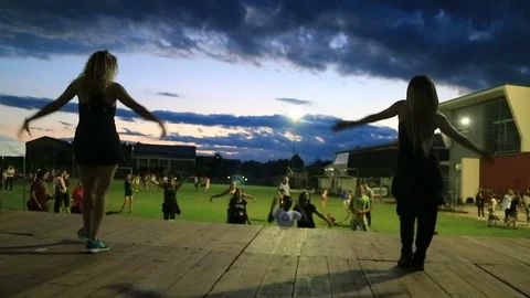 A zumba lesson on the lawn Stock Footage 105223845