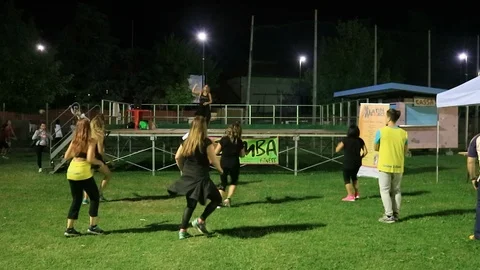 A zumba lesson on the lawn Stock Footage 105232838