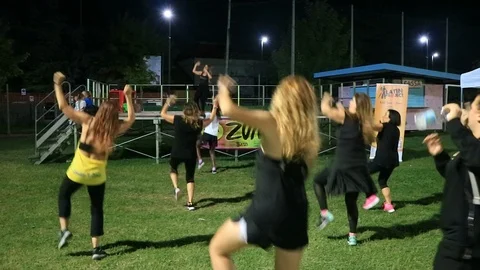 A zumba lesson on the lawn Stock-Footage 105233100